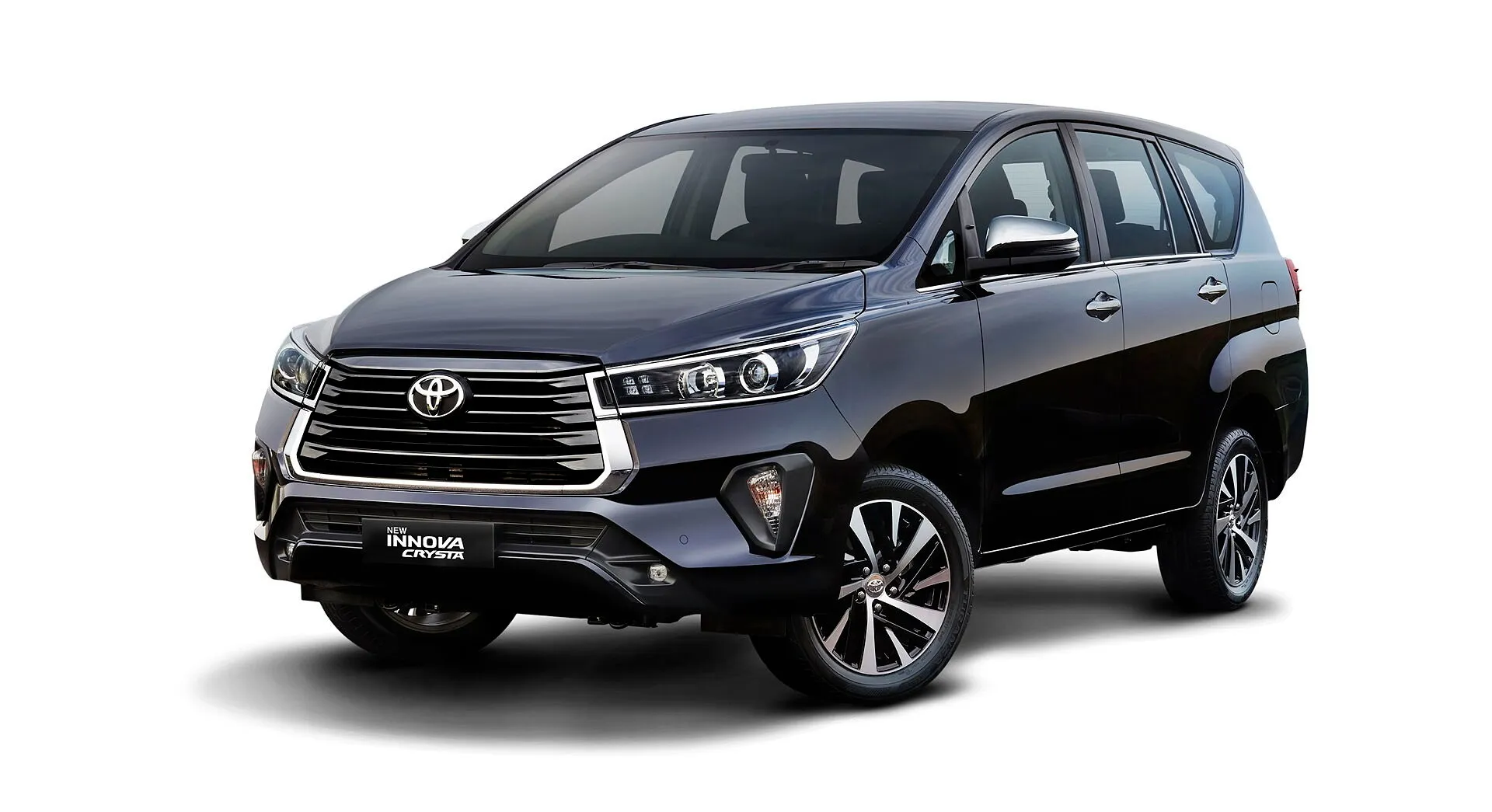White Toyota Innova Crysta